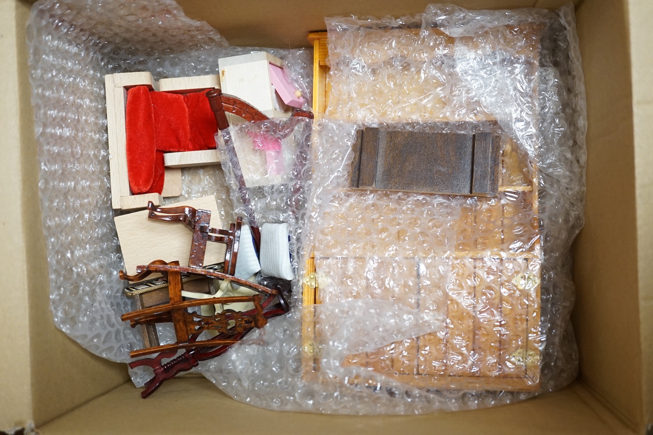 A large group of doll's furnishings